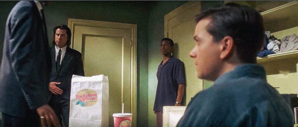 Still from the film Pulp Fiction, with a new logo on the bag and drink 