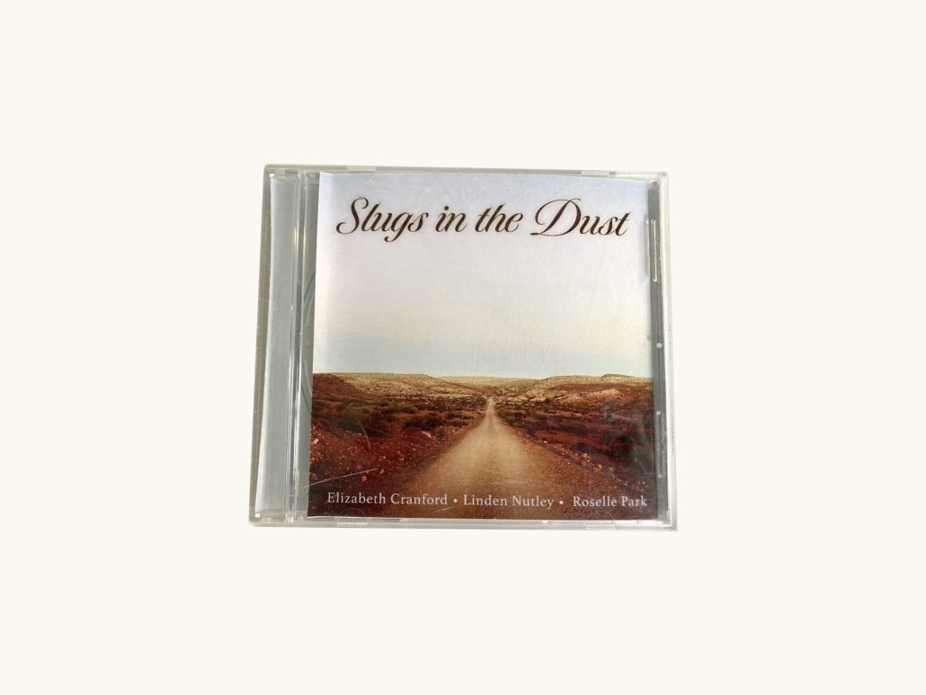 CD case: Slugs in the Dust